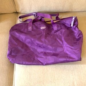 Coach canvas tote in beautiful purple , with smaller matching pouch
